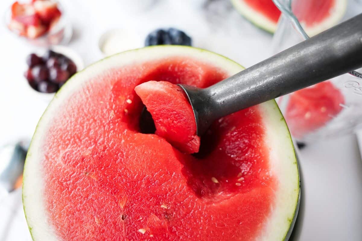 ice cream scoop scooping out watermelon