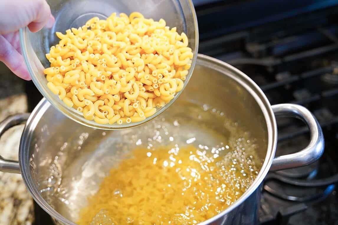 Pasta into boiling water