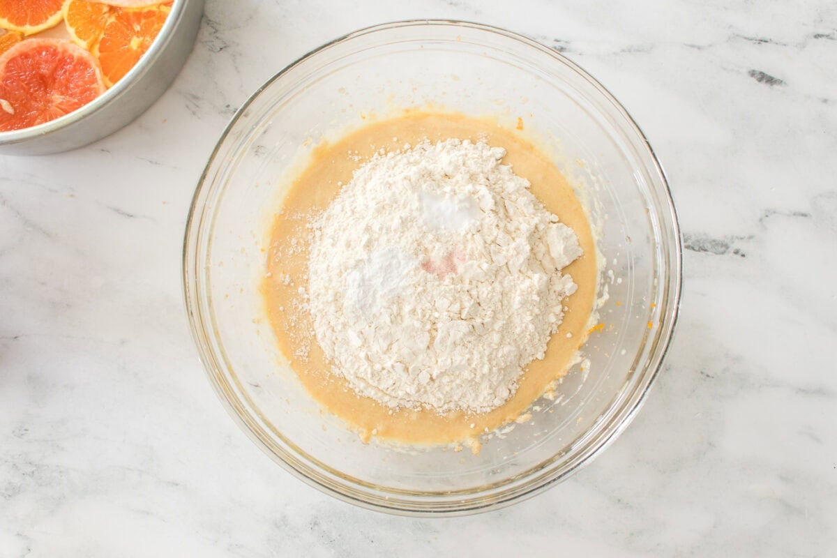 sugar, butter and light brown sugar orange juice, orange zest and vanilla extract yogurt and two eggs creamed together with flour, baking soda and salt before mixing in a glass bowl