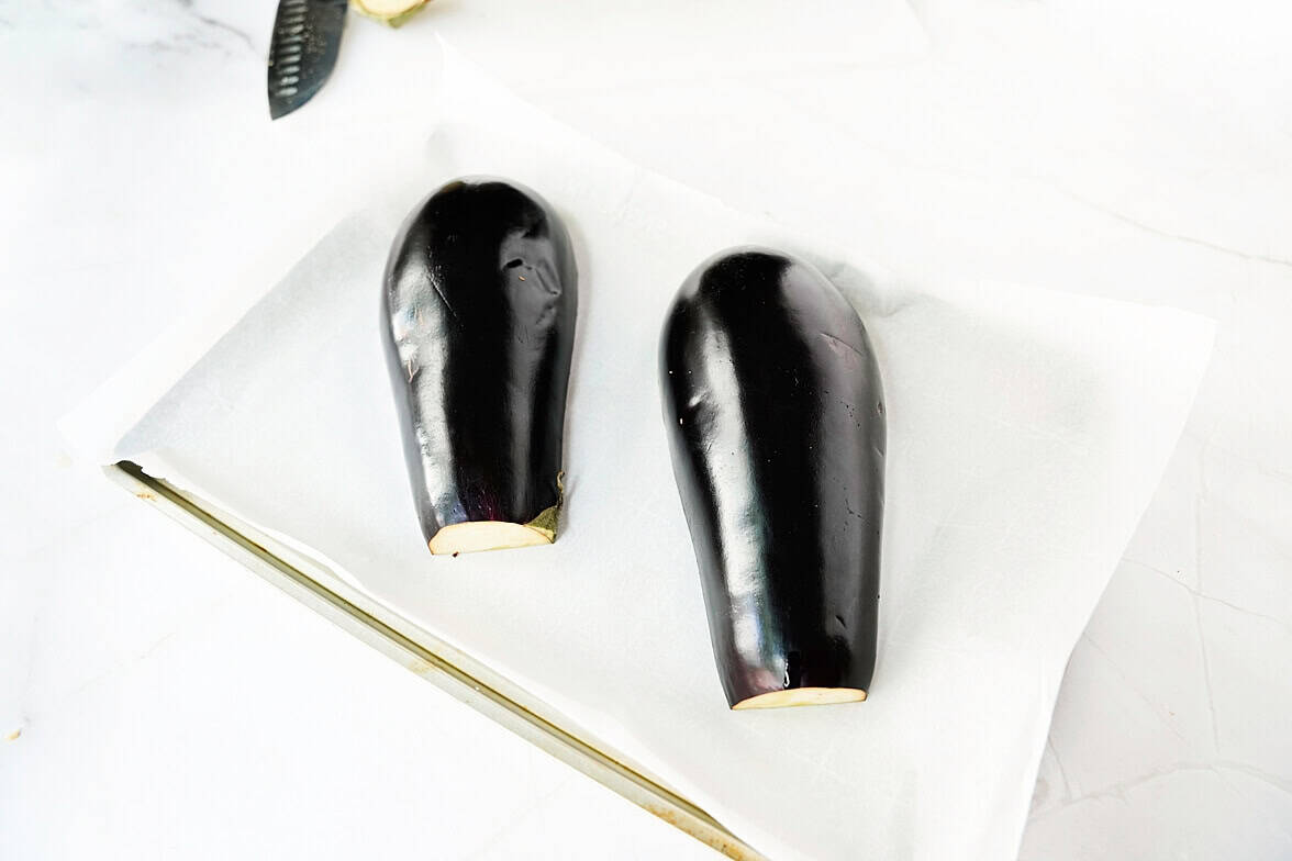 cut eggplant on sheet pan for roasting