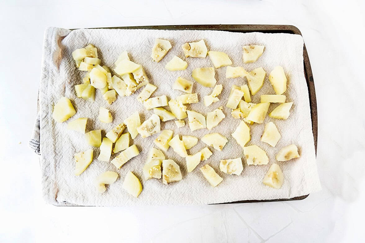 eggplant pieces on sheet pan to dry after blanching