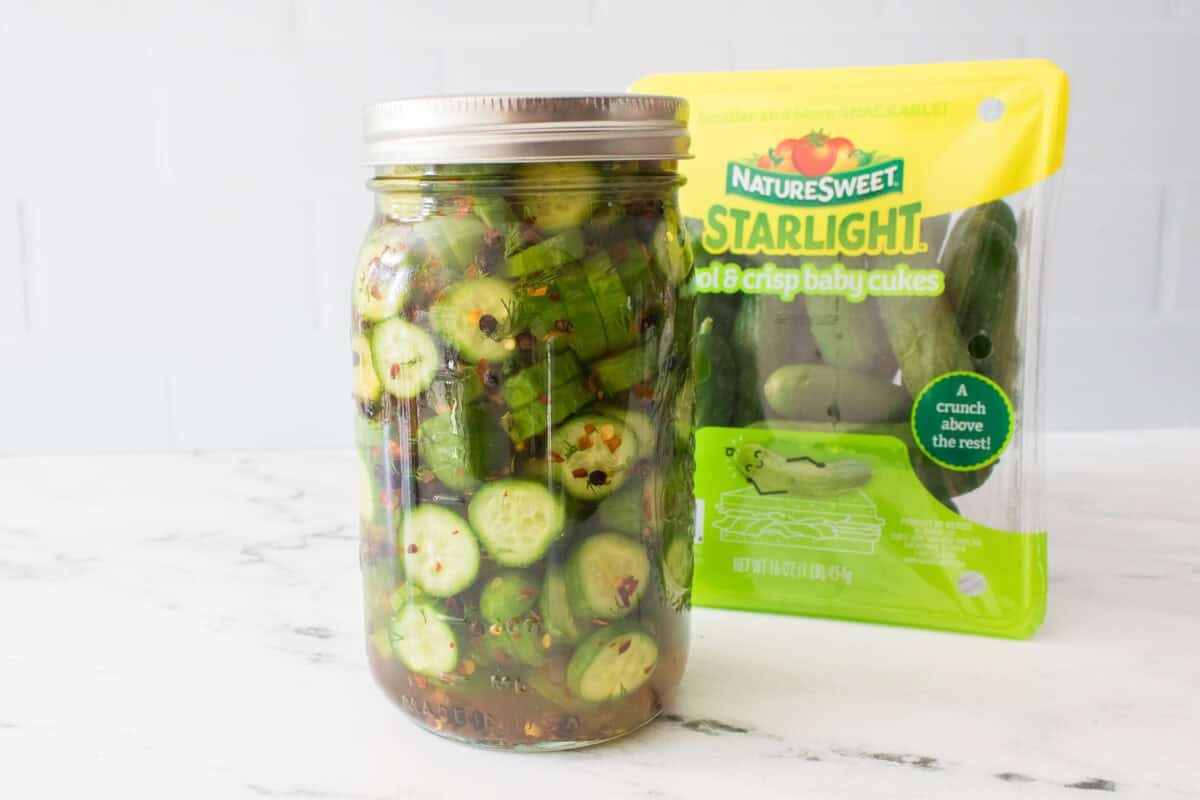 wide mouth mason jar with quick pickled cucumbers with naturesweet starlight baby cukes