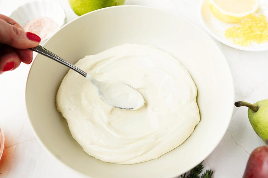 laying the whipped ricotta in the bowl