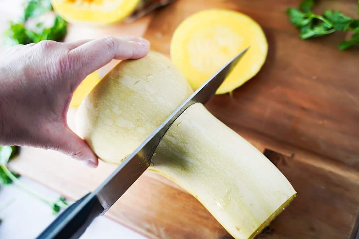 Cutting the neck of the butternut squash