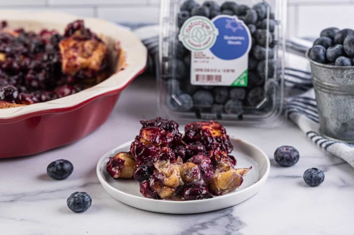 A serving of blueberry cinnamon roll casserole