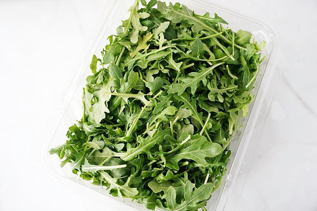 Arugula in a clear dish