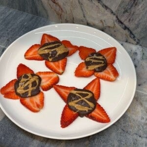 White plate with strawberry banana bark