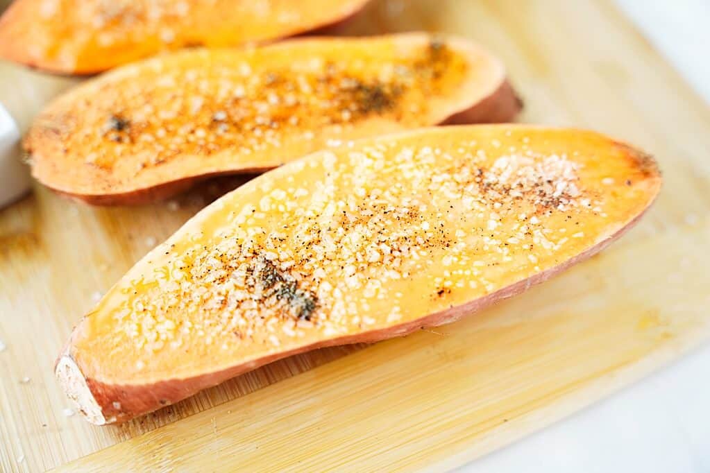 Sweet potato half with olive oil and salt & pepper