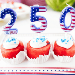 Watermelon Cupcakes with red, white and blue 250 candles on a red, white and blue plate