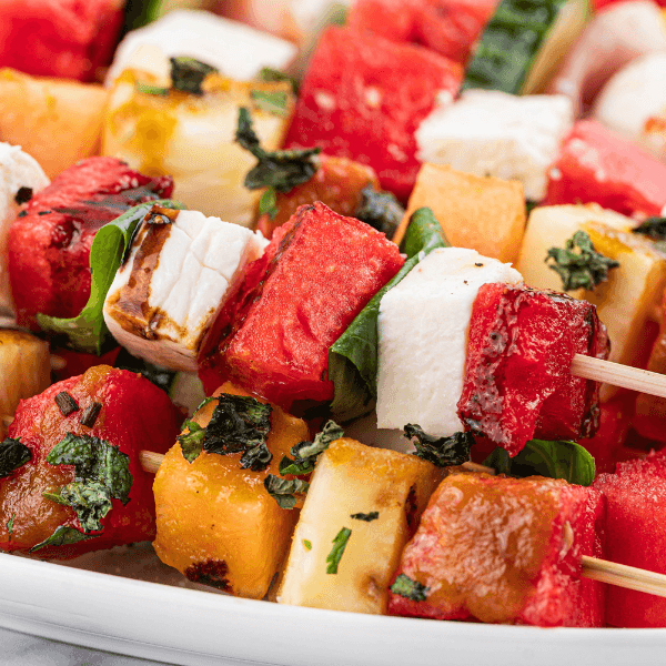 Close up of Watermelon skewers on a white plate