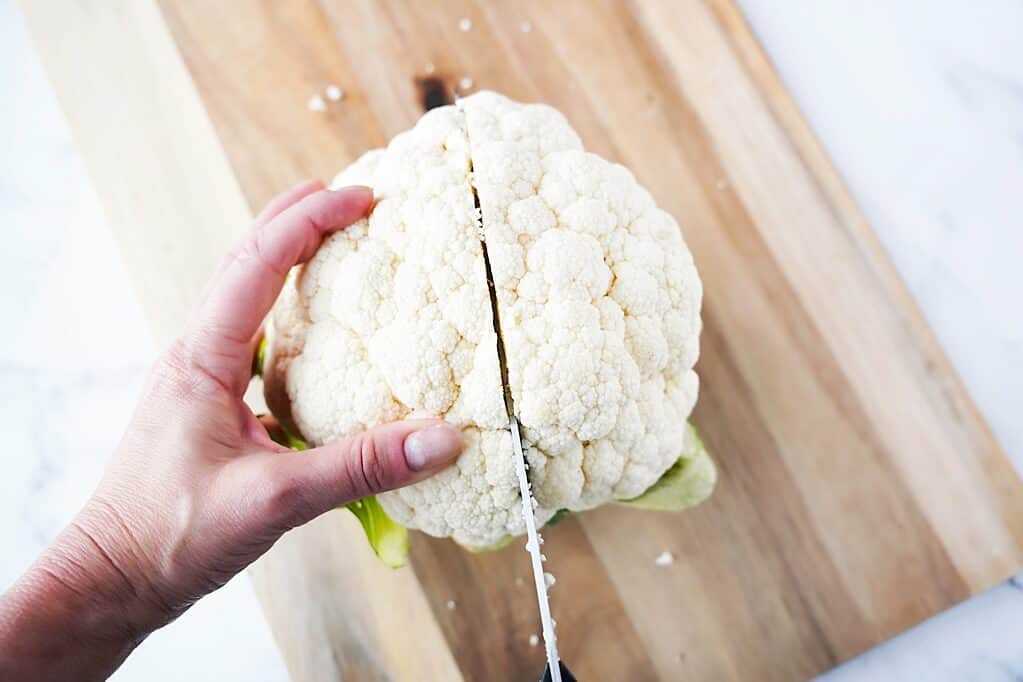 Cutting head of cauliflower in half