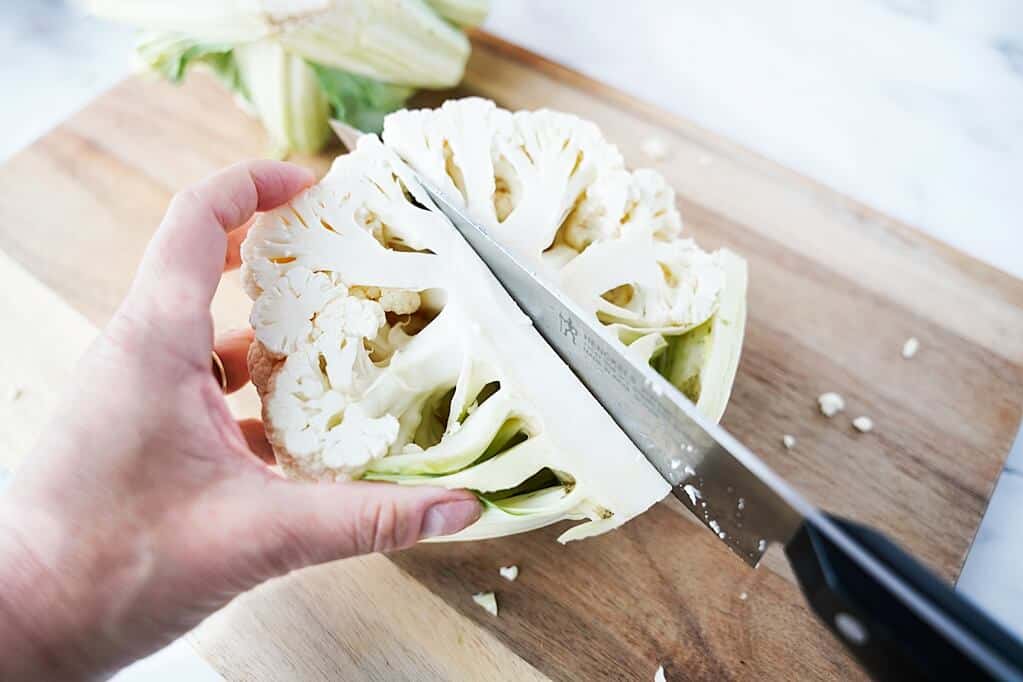 Cutting out the core of the cauliflower
