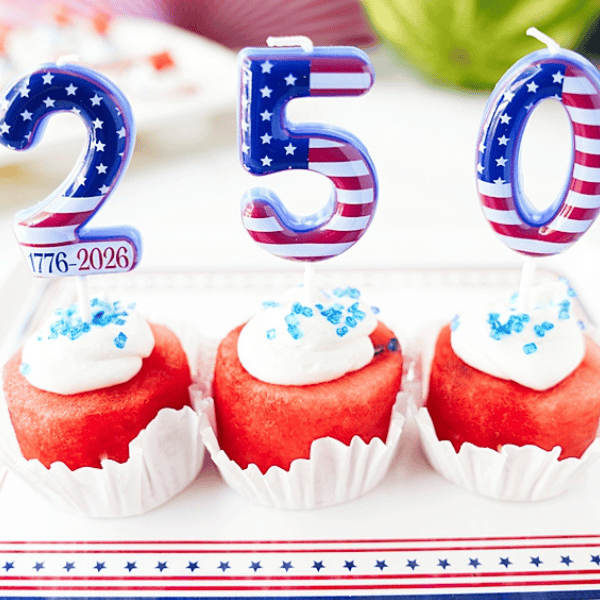 250 candles in Watermelon Cucapkes on red, white and blue plate