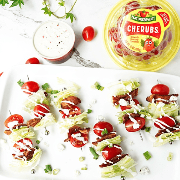 Wedge Salad on a Stick with Cherubs in background