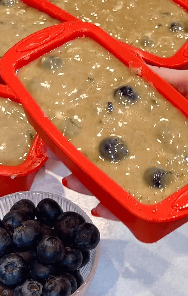 Blueberry Zucchini bread batter in loaf pans