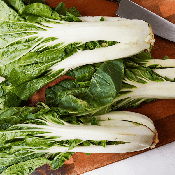 Bok Choy on cutting board with knife