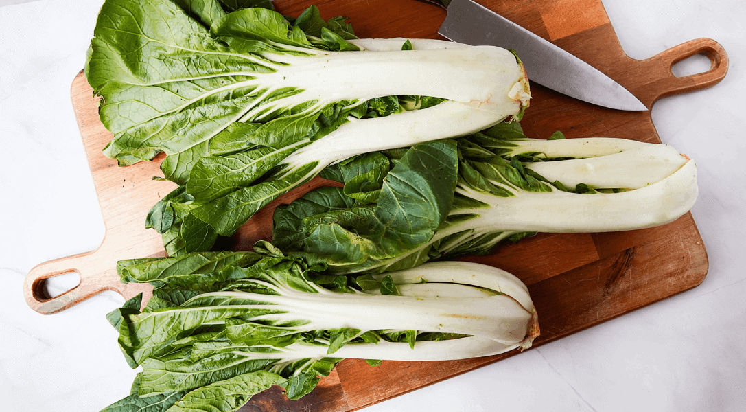 Bok Choy on cutting board with knife