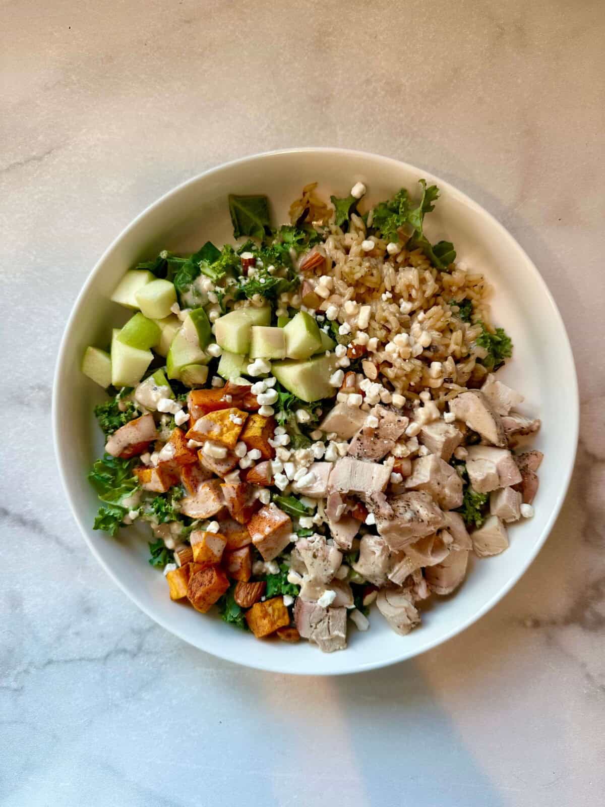 Vertical image of Sweetgreen Harvest Salad
